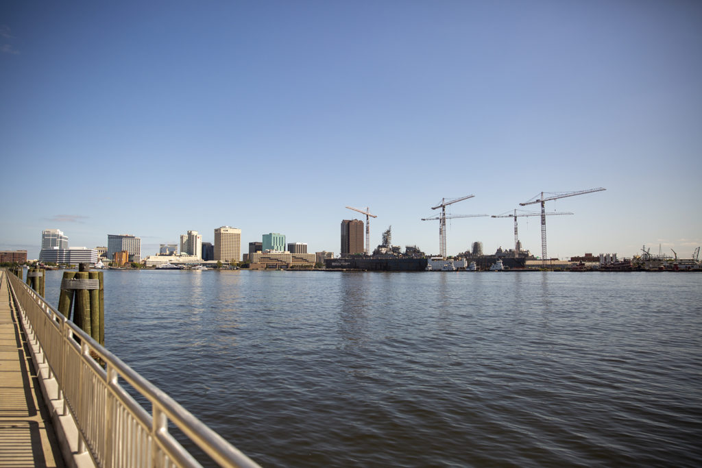 A view of Norfolk's Waterside District and downtown from the Portsmouth seawall near the Portsmouth Naval Shipyard Museum. | Photo by Nicholas Crawford